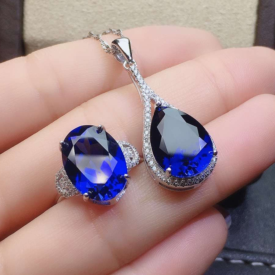 Elegant sapphire pendant drop-shaped with zircon