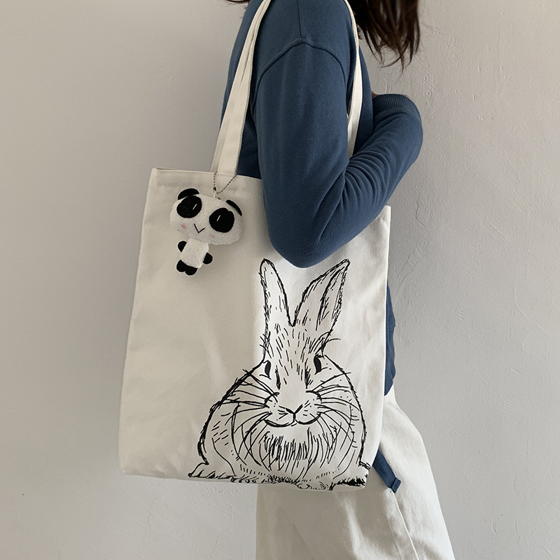 Bolsa de lona femenina estudiante de un solo hombro japonés ins bolsa de tela impresa de dibujos animados lindo de gran capacidad