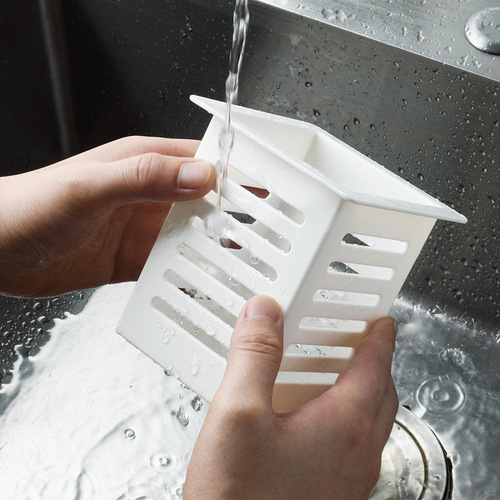 Japanese simple hollow wall-mounted chopstick cage punch-free tableware storage box kitchen spoon chopstick drain rack