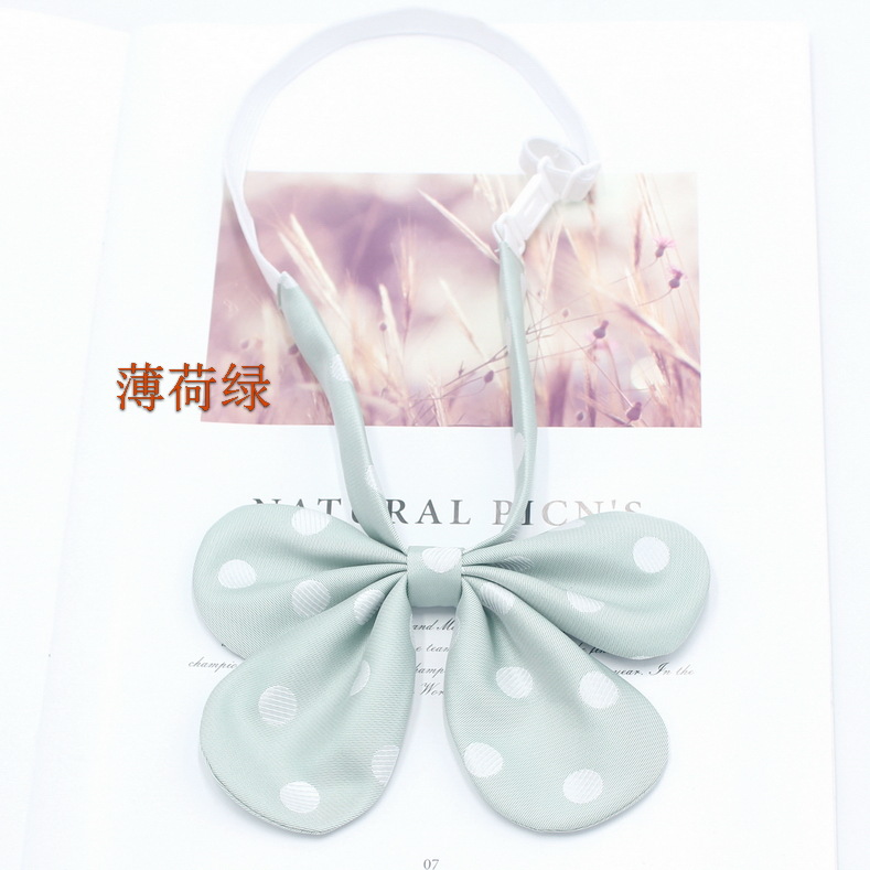 Pluma curvada raíz conejo oreja collar flor pajarita femenina estilo coreano lunares lindo arco JK uniforme pajarita fabricante en stock