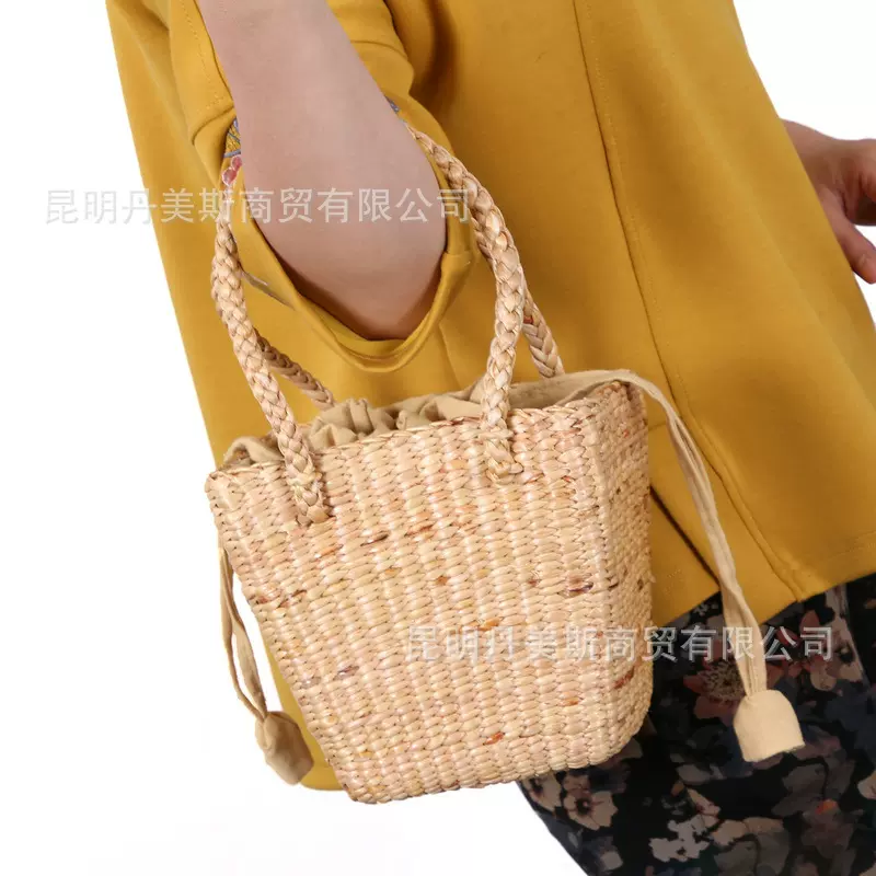 2023新款泰国时尚草编包立体方形手提包逛街出游个性拎包抽带式
