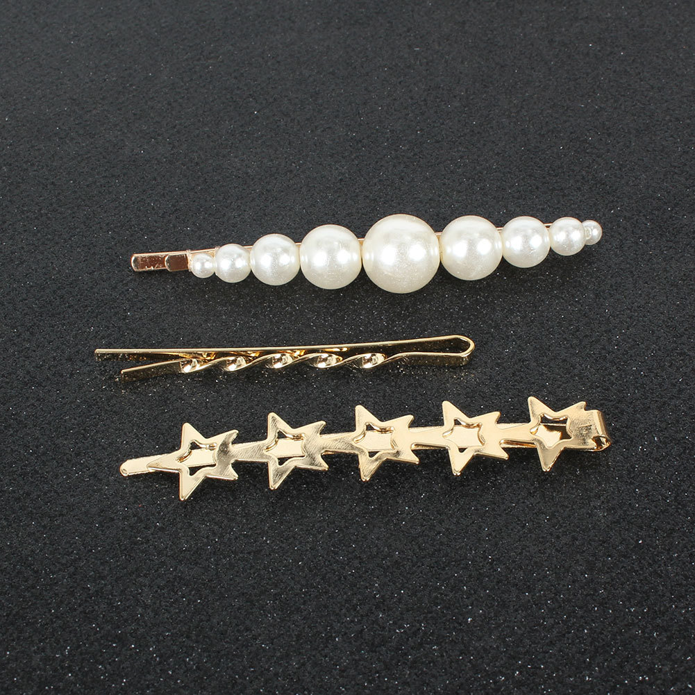 Korean Sweet Wind Five-pointed Star Hairpin Alloy Inlaid Pearl Word Clip Hair Accessories Wholesale display picture 3