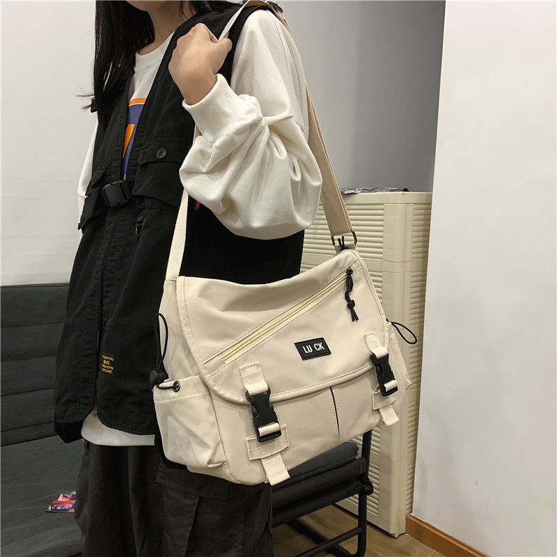 Japanese and Korean ins The single shoulder bag man street personality Canvas bag Hip hop Inclined shoulder bag