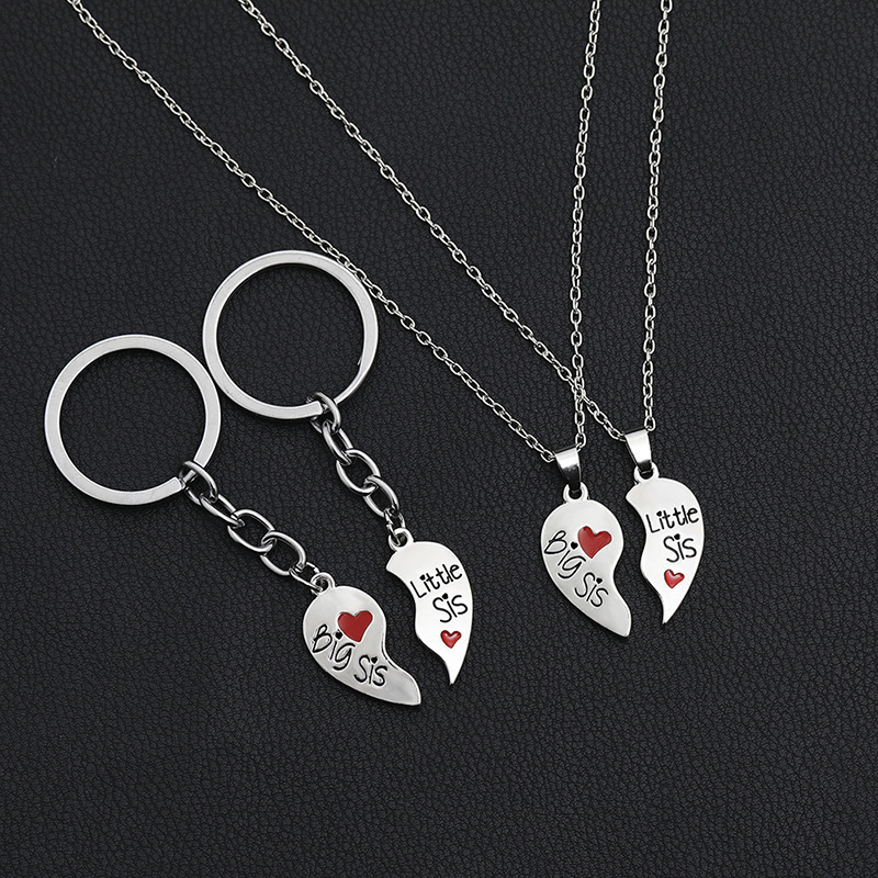 New English Big Middle Little Two-petal Love Stitching Necklace Key Chain Set display picture 3