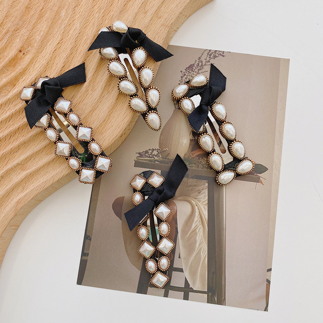 Pearl Bow Knot Korean Fashion Alloy Hair Clip Back Head Hairpin Women's Side Clip Wholesale display picture 9