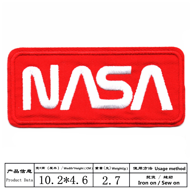 White rectangular badge, (Cross-border trading), with embroidery, English