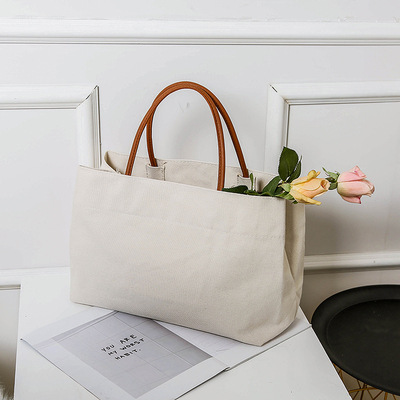 Korean minimalist solid color canvas women's artistic shoulder student backpack, handheld environmentally friendly_voghion.com