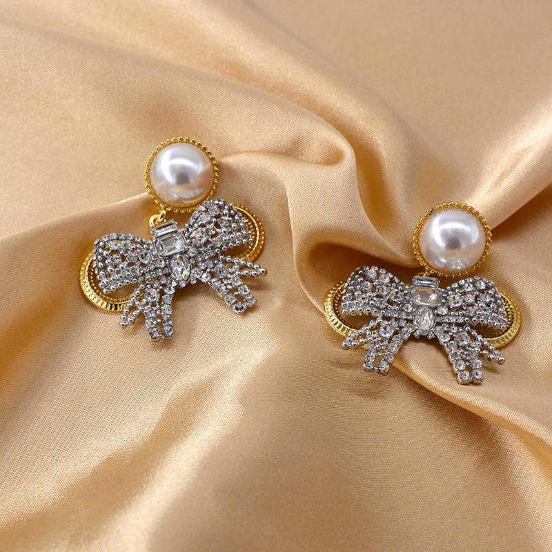 New Baroque Flash Diamond Elegant Pearl Bow 925 Silver Pin Earrings Wholesale display picture 3
