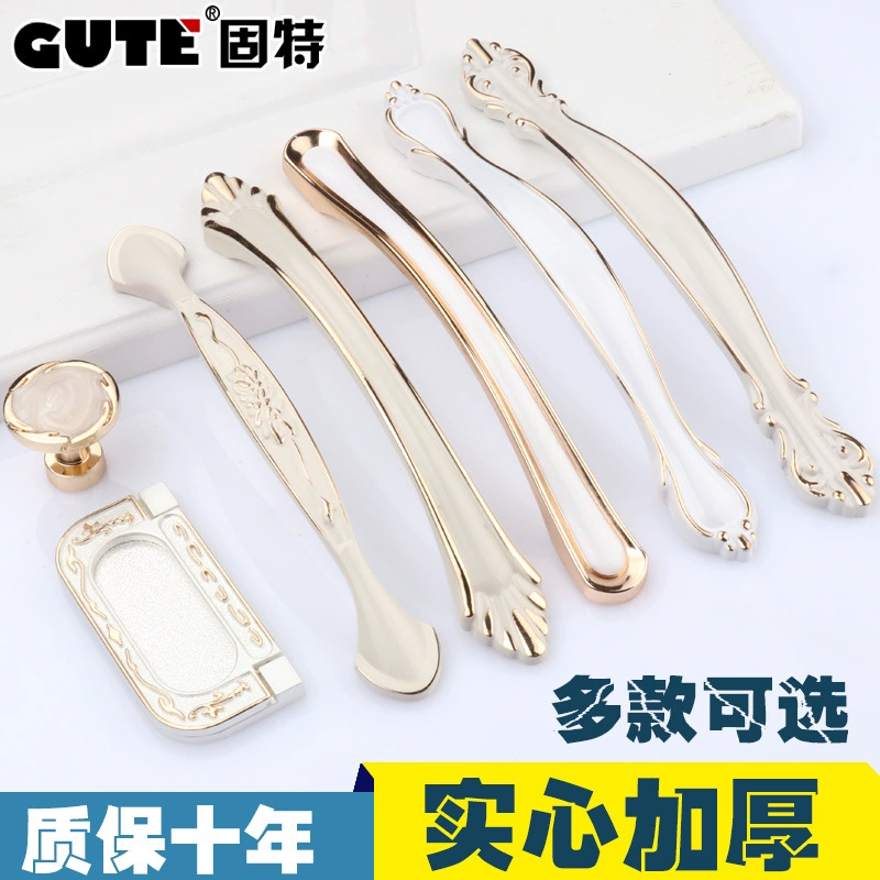 Индийская? Wait: The second is Chinese: Ivory white pull hand modern simple cabinet door drawer pull handwater closet door handle