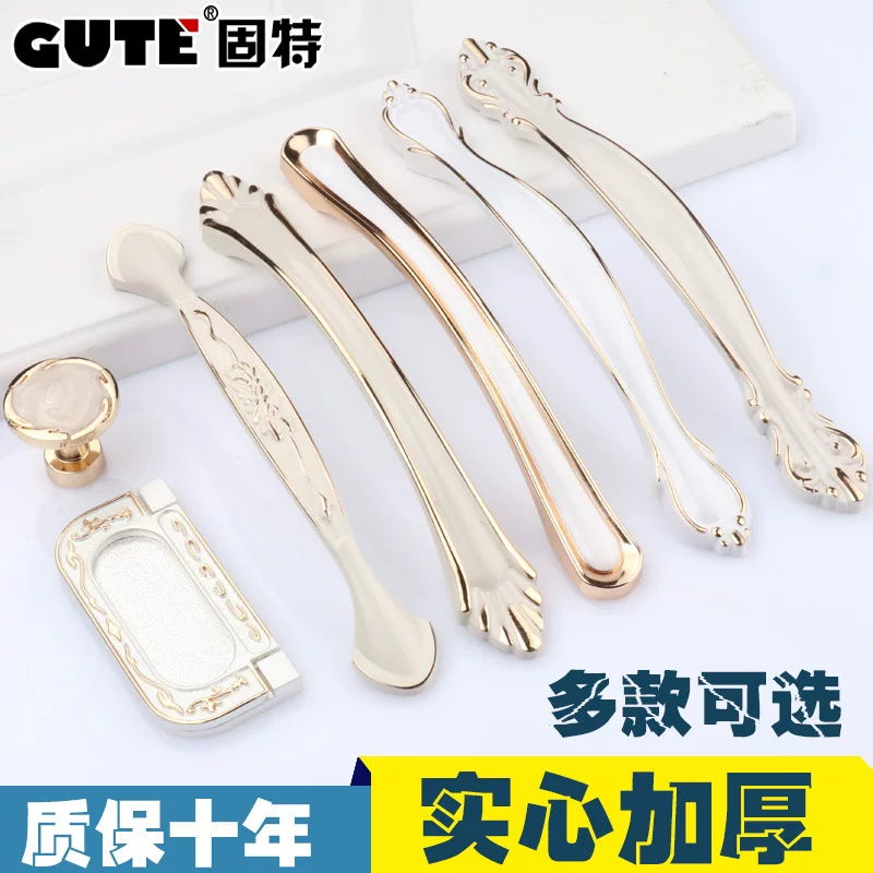 Индийская? Wait: The second is Chinese: Ivory white pull hand modern simple cabinet door drawer pull handwater closet door handle