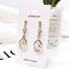 Fashionable earrings, silver needle, cat's eye, silver 925 sample