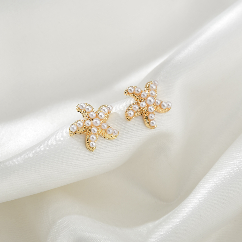 Korea Small Pearl Simple And Versatile Starfish Shell Earrings Wholesale Nihaojewelry display picture 2