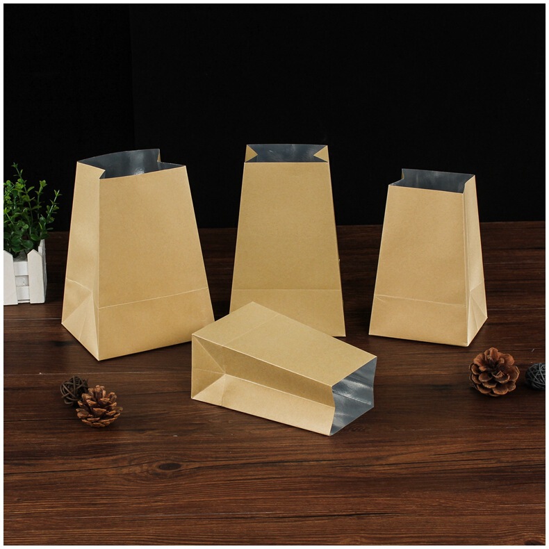 Self-supporting Kraft paper tea packaging bag green tea Longjing black tea scented tea bulk tea bag aluminum foil earthwork tea bag Self-supporting Kraft paper tea packaging bag green tea Longjing black tea scented tea bulk tea bag aluminum foil earthwork tea bag