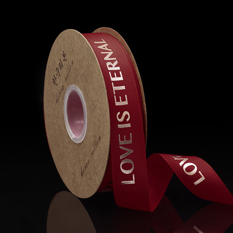 2,5 cm dorado cinta tienda de flores material de DIY floral al por mayor de la flor de poliéster Inglés carta envuelta cinta de la flor