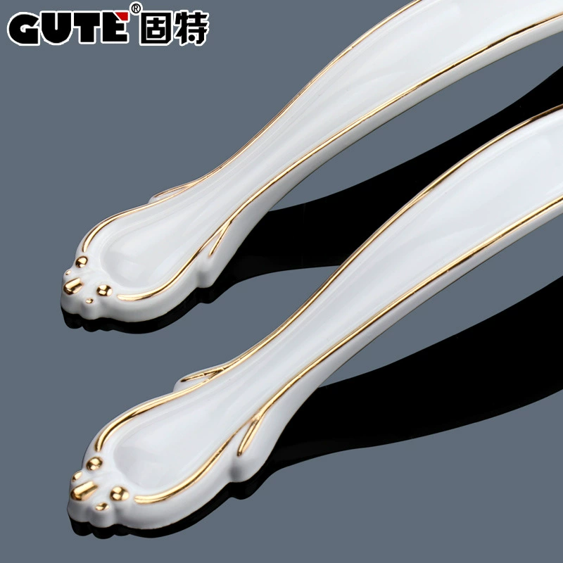 Индийская? Wait: The second is Chinese: Ivory white pull hand modern simple cabinet door drawer pull handwater closet door handle