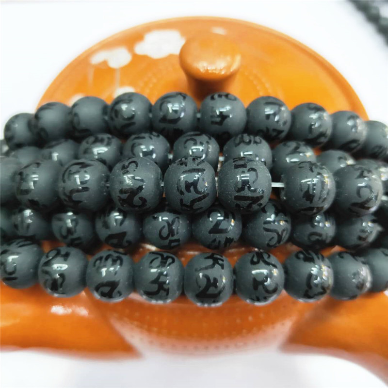 Factory direct sales of six-character mantra Buddhist prayer beads, wholesale of black matte stone semi-finished products with embossed characters, DIY jewelry and matching beads detail image 1