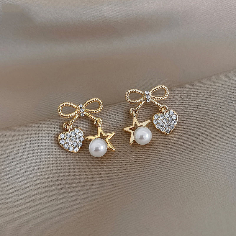 925 Silver Needle Bowknot Pearl Diamond Earrings display picture 6