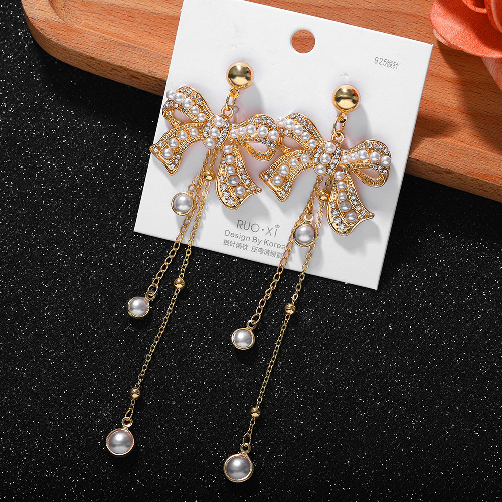 Moda Coreana Exquisitos Arcos Pendientes Mujer Nueva Cadena Borla Rhinestone Plata Aguja Pendientes display picture 6