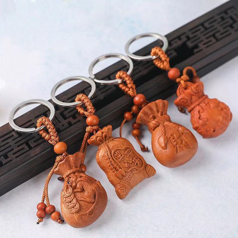 福运桃木雕刻钥匙扣招财挂饰摆件钱袋福袋招财进宝厂家批发|ms