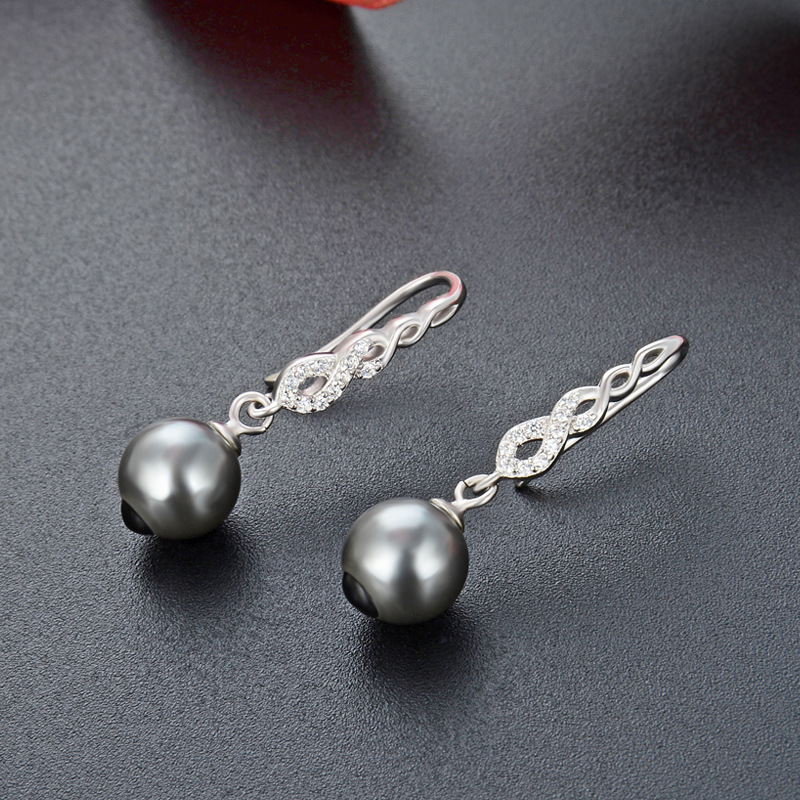 Corea del Sur Dongdaemun s925 pendientes de plata pendientes de perlas elegantes de las mujeres Retro Luz de lujo fuente de joyería de plata fábrica