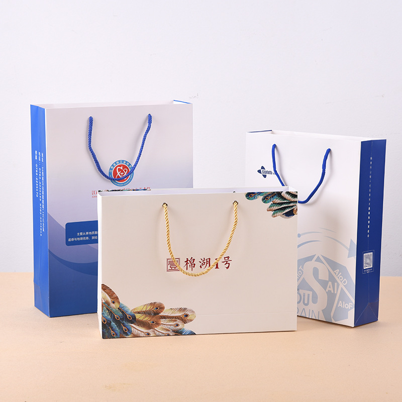 厂家批发白卡纸袋定 做礼品服装袋定 制LOGO 各种纸袋手提袋订 做