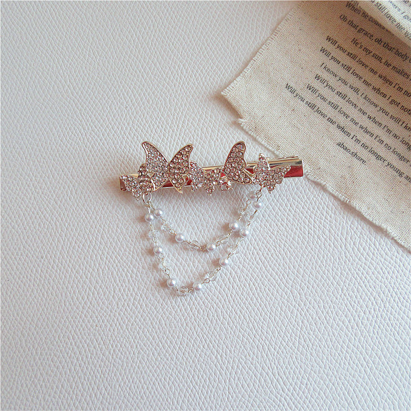 Pearl Rhinestone Butterfly Hairpin Retro Style Hair Clip display picture 3