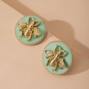 Fashion Twisted Double Button Exaggerated Earrings display picture 9