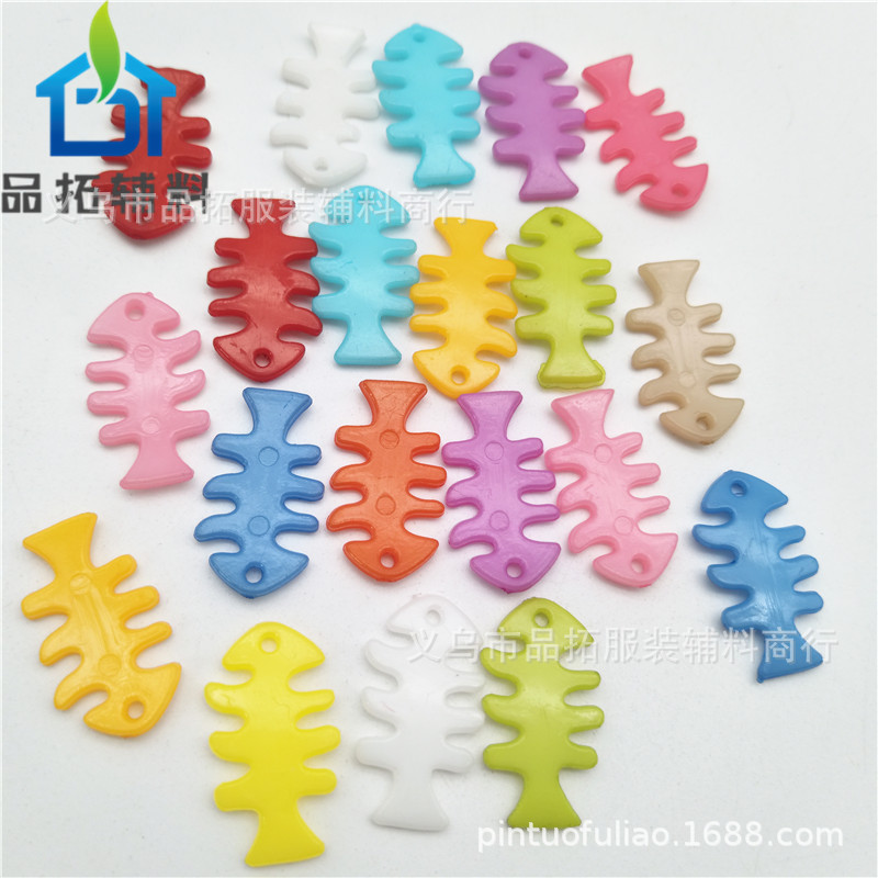 厂家批发彩色鱼骨卡通塑料纽扣 手工材料DIY糖果色鱼形纽扣