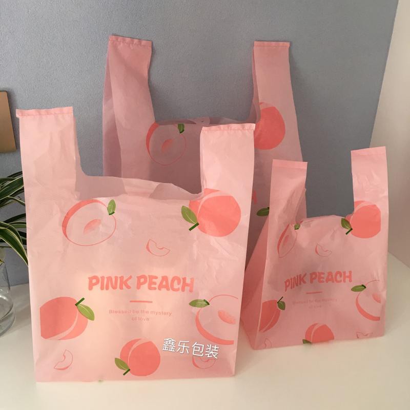 网红蜜桃水果图案粉色塑料手提袋服装礼品烘焙甜品零食打包袋包邮