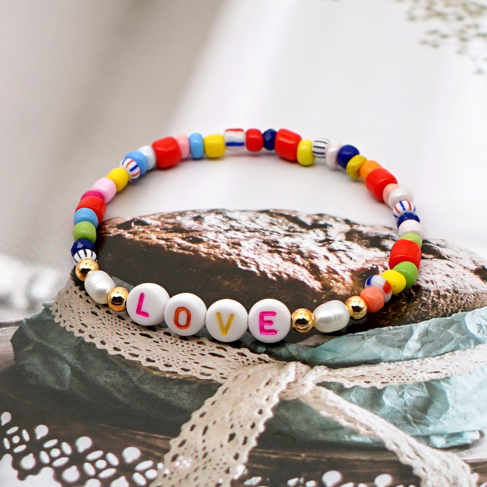 Vintage Baroque Pearls Simple Rainbow Beads English Letter Love Bracelet display picture 2