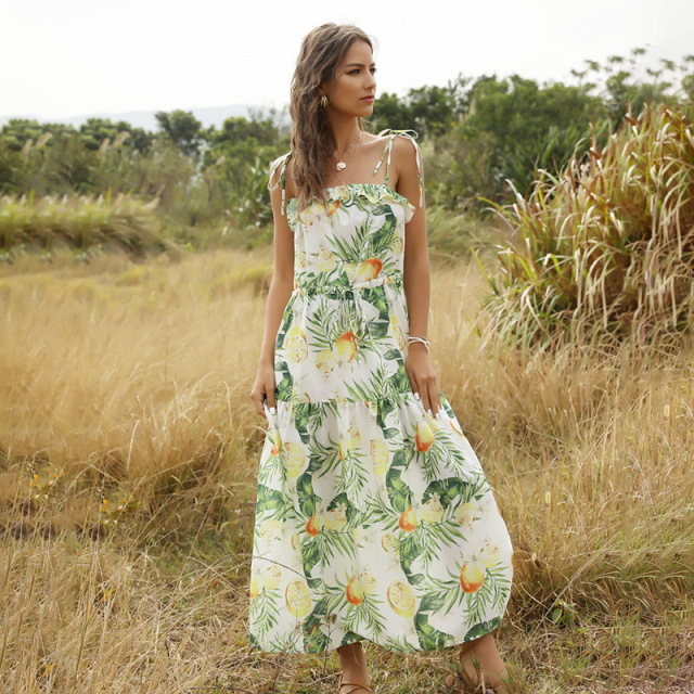 Long dress with halter tie and fruit print