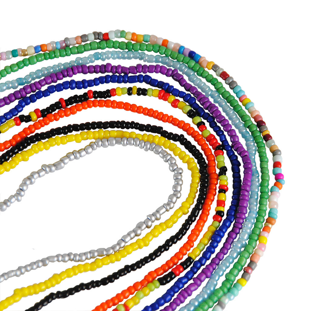 Joyería transfronteriza europea y americana simple de una sola capa hecha a mano Cadena de cuerpo de cuentas de arroz de color de contraste elástico cadena de la cintura para las mujeres