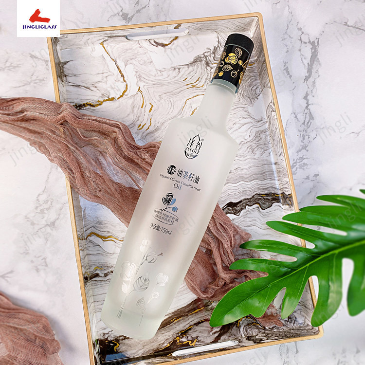 厂家供750ML高D茶油瓶、核桃茶籽油玻璃油瓶瓶，配弹簧盖