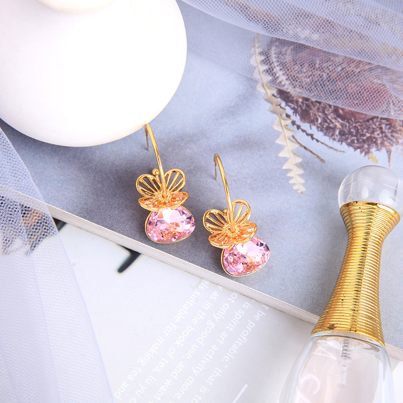 S925 Silver Fashion Hollow Flower Earrings display picture 2