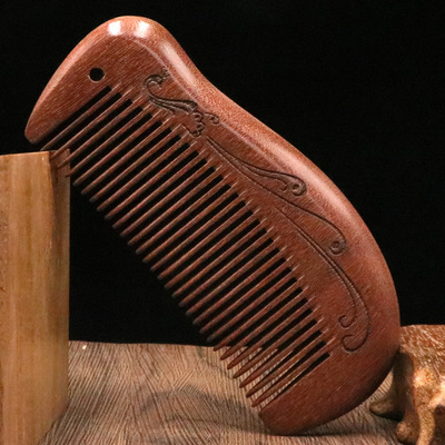 厂家直销精品小号红檀木梳子防静电孔雀梳子支持定制ogo加厚款