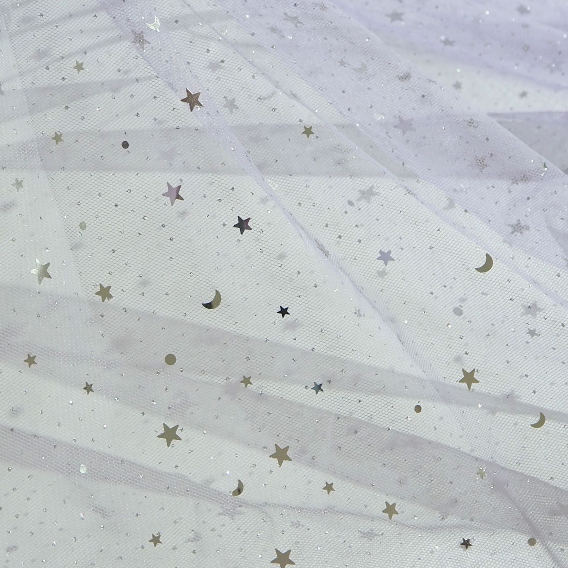 Suministro de stock de estrellas multicolores de luna puntos de malla hexagonal tela de vestido de ropa infantil