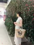 镶钻卡通猫休闲欧美草编包