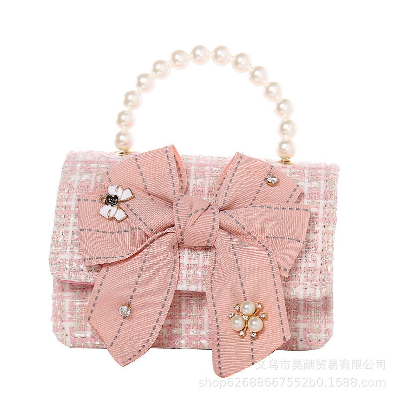 2021 estilo Chanel nueva versión colorida mariposa nudo portátil perla hombro crossbody bolso de los niños 923