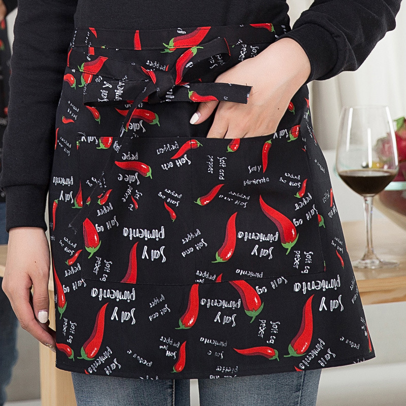 Camarero hombres y mujeres corto delantal negro restaurante del hotel restaurante Occidental cafetería cocina media cintura