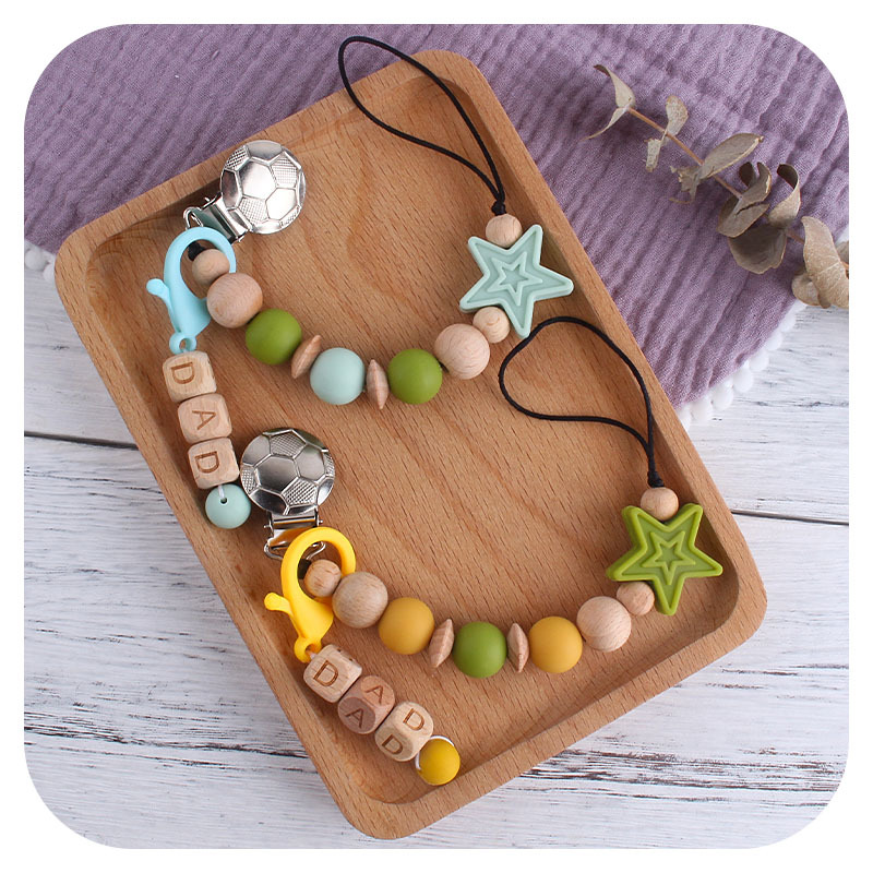 Nuevo clip de chupete de fútbol de hierro bebé creativo Haya PAPÁ langosta hebilla pacificar estrella de cinco puntas Cadena de chupete de silicona