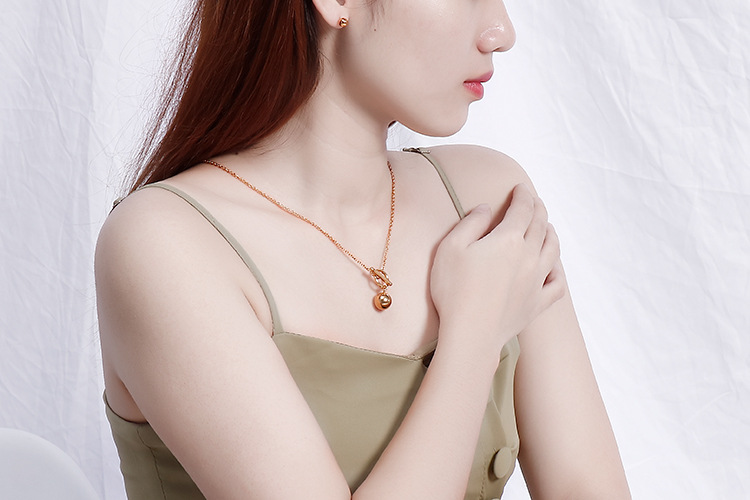 simple fashionable golden ball OT buckle necklace earrings stainless steel set wholesale nihaojewelr