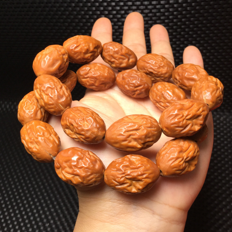 橄榄核碎料文玩包浆,怎么看橄榄核包浆了没,橄榄核手套包浆_大山谷图库