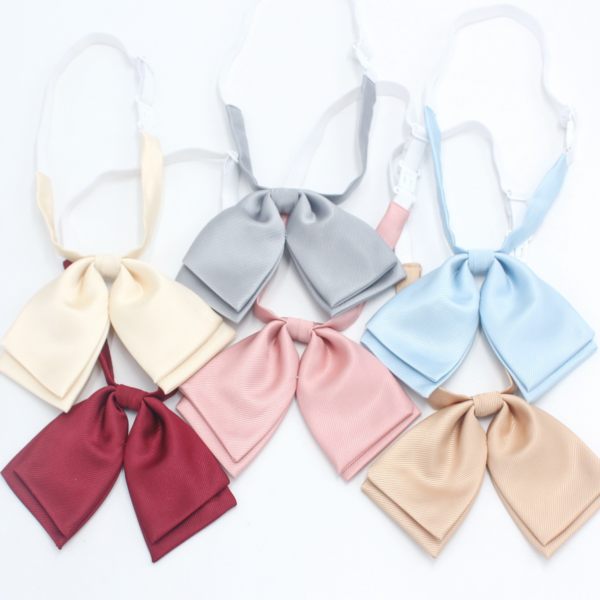 Directo de fábrica de color sólido de doble capa de sarga pajarita uniforme escolar de las niñas a juego arco coreano casual JK pajarita collar flor