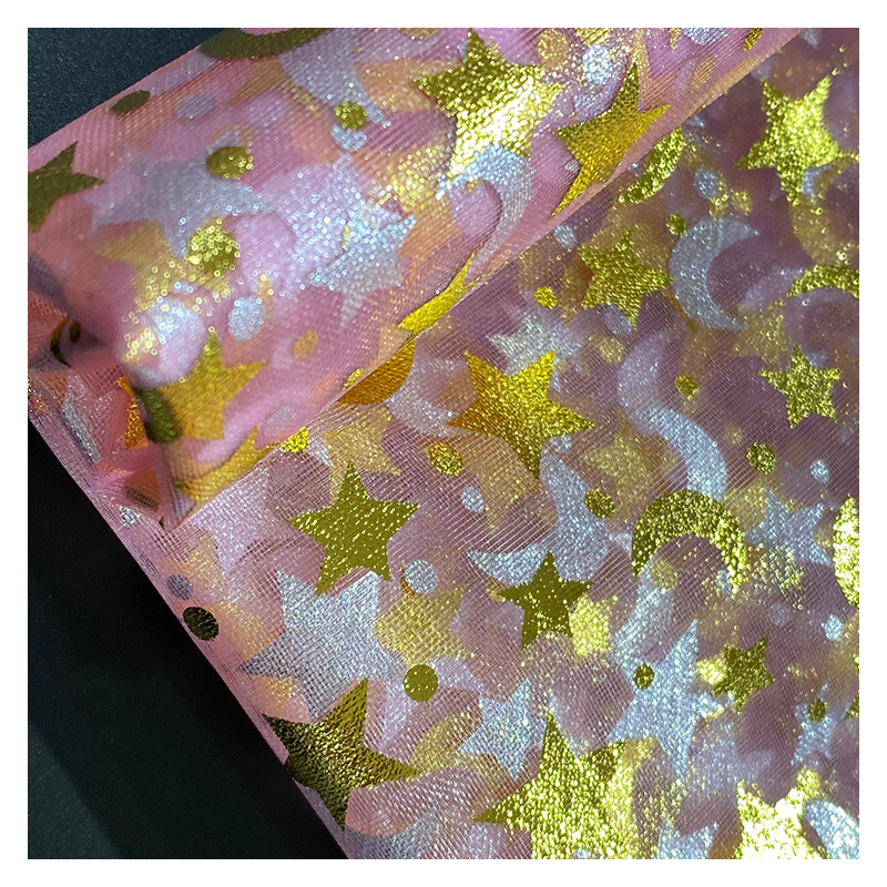 Fabricante suministro de ergena estrellas de la luna estampado tela de red de embalaje de boda bolsa tela de vestido