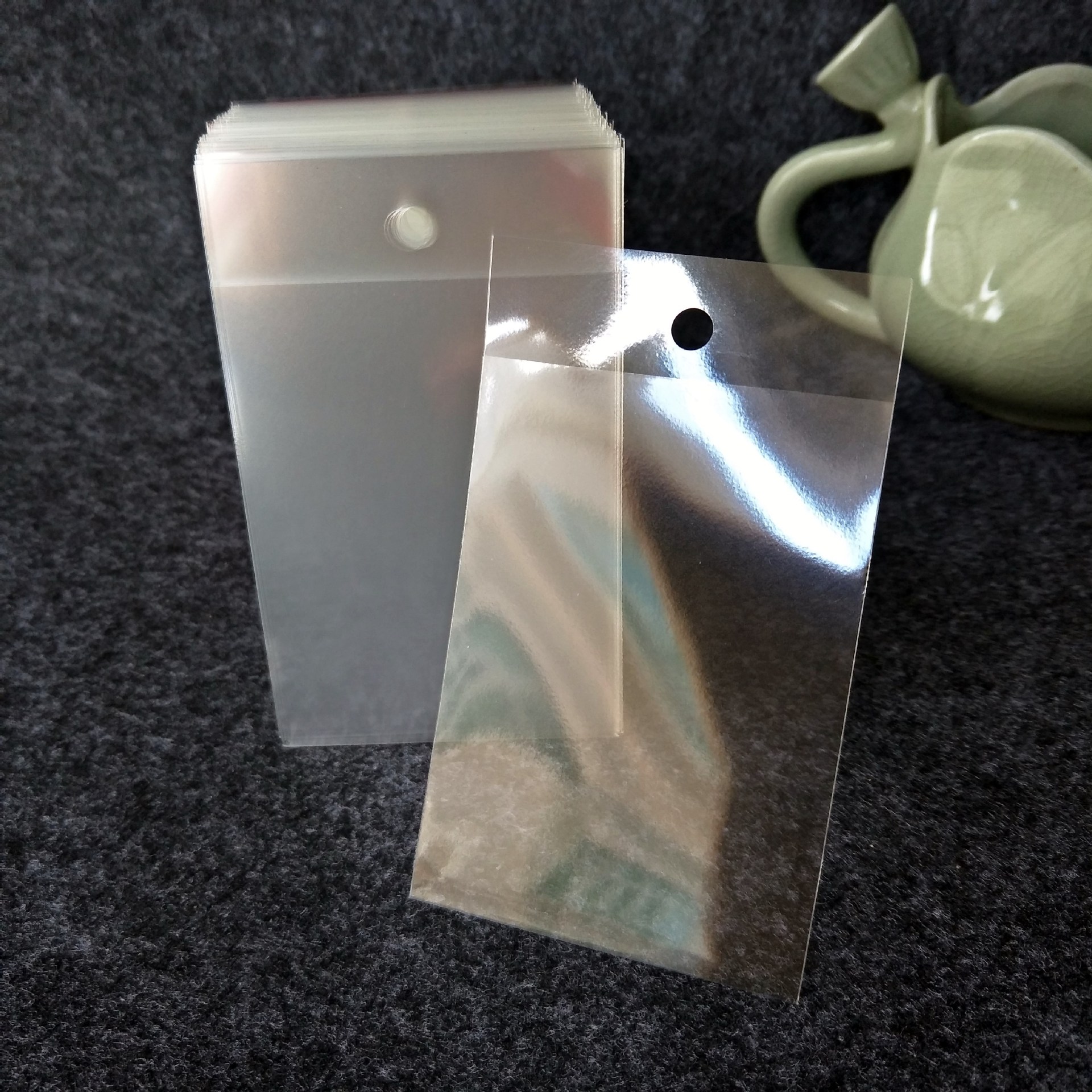 定制OPP/PP自粘封口袋透明卡套平口袋奥特曼卡片袋游戏卡防尘防护-阿里巴巴