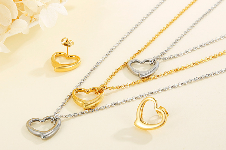 hollow heart-shaped three-layer necklace clavicle chain earrings set titanium steel set