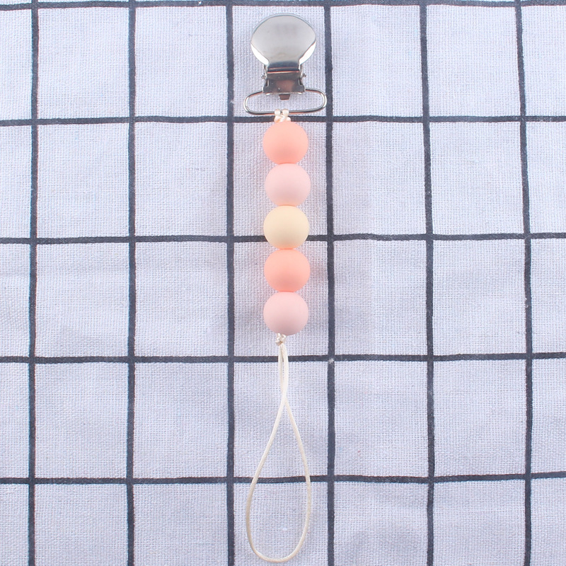 Cadena de pezón de silicona calmante Nuevo clip de hierro clip de pezón Dispositivo de molienda de dientes de bebé cadena anti-caída cadena anti-perdida