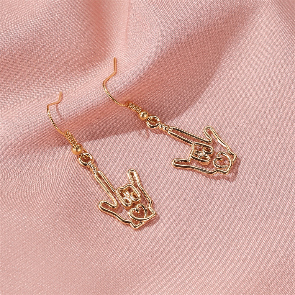 Nouvelles Boucles D'oreilles Simples Boucles D'oreilles Geste Creux Dames Aiment Palm Pendentif Boucles D'oreilles En Gros Nihaojewelry display picture 6