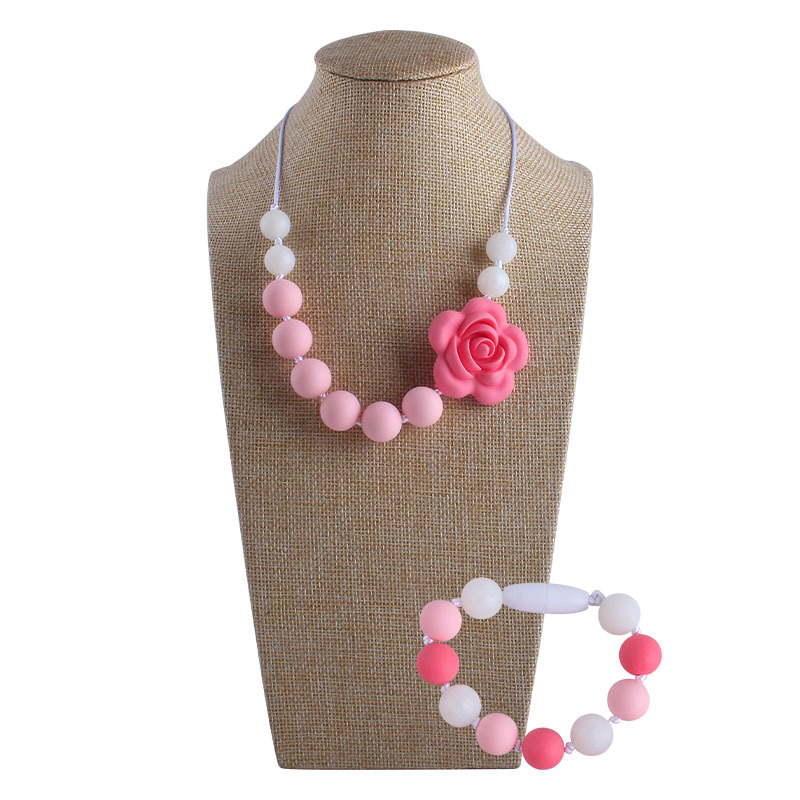 Venta caliente forma de Rosa collar de silicona mordedor masticable colgante infantil molar mordedor de silicona pulsera de cuentas