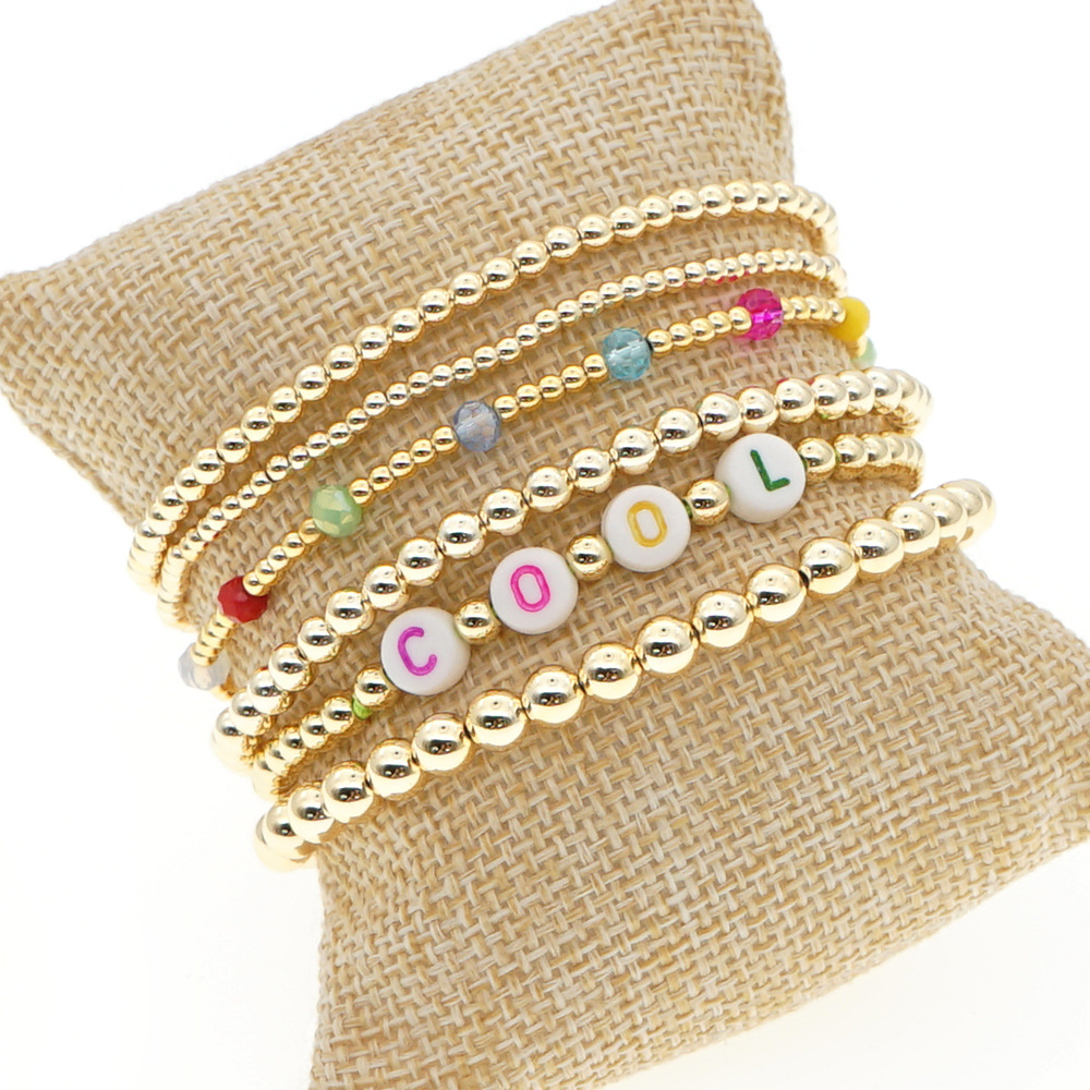 Fashion Trend Natural Pearl Soft Ceramic Multi-layered Beaded Imported Color-preserving Gold Bead Letter Bracelet display picture 2